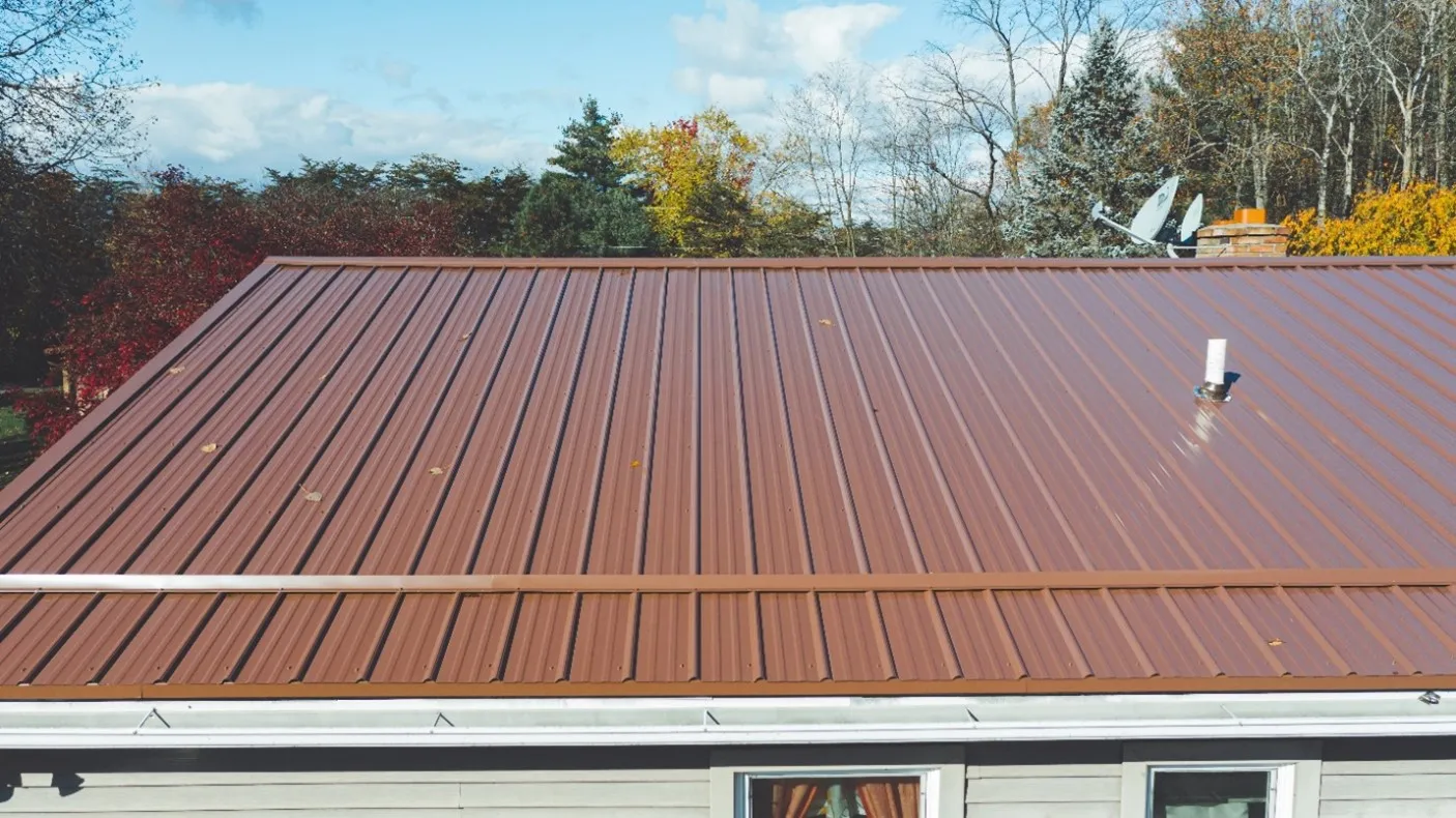 A metal roof installation in progress